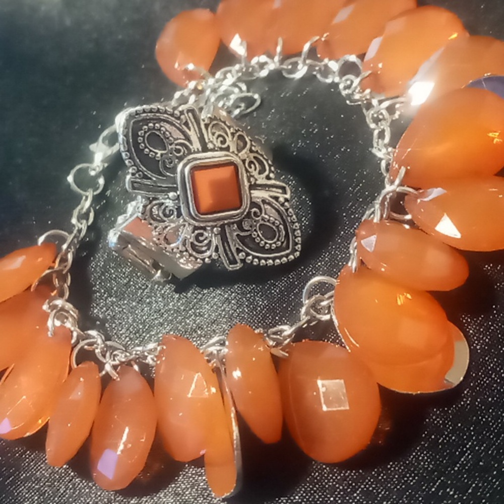 Bracelet extendable & statement ring expandable.